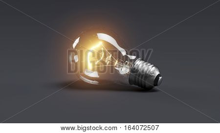 Low glowing electric bulb lamp on dark background 3d
