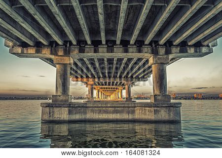 Central bridge in Dnepropetrovsk at sunset. Dnieper river. Ukraine.