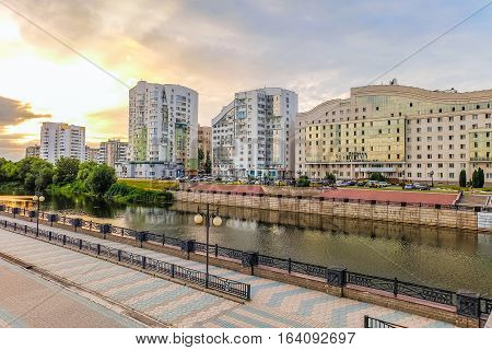 BELGOROD RUSSIA - JULY 04 2016: Belgorod State University Embankment overlooking the student residence and left-bank residential neighborhood. Belgorod cityscape on the sunset.