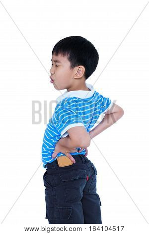 Asian Child Rubbing The Muscles Of His Lower Back. Isolated On White Background.