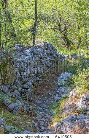 Old stone wall in Tucepi, Dalmatian village in the slope of a mountain Biokovo.