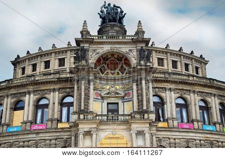 DRESDEN GERMANY - AUGUST 13 2016: Semperoper opera (Staatskapelle Dresden) at Theaterplatz building was designed by Gottfried Semper in Dresden Germany on August 13 2016.