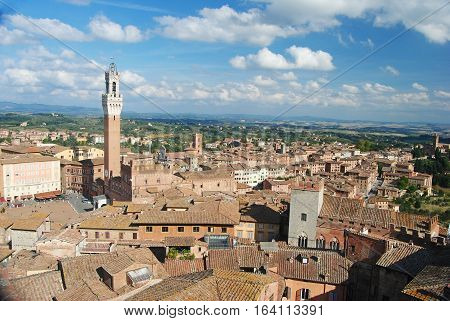 View over Siena, Italy with Palazzo Comunale on the left.