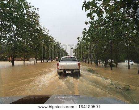 PATTALUNG, THAILAND, JAN 4, 2017: Water flooding on the street in Thailand