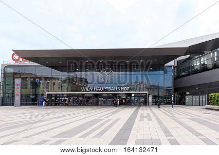 VIENNA, AUSTRIA - MAY 18, 2016: Facade of the main railway station of wien with OBB logo company and people