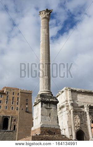 Ancient Column of Emperor Phocas in the center of Roman Forum with clouds