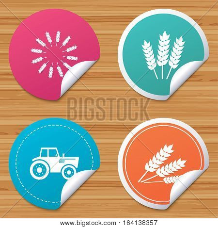 Round stickers or website banners. Agricultural icons. Wheat corn or Gluten free signs symbols. Tractor machinery. Circle badges with bended corner. Vector