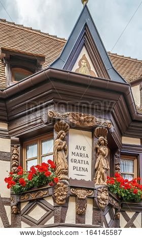 Bay window with flowers in Ribeauville Alsace France