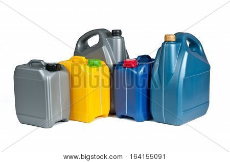 Plastic canisters for machine oil isolated on white background.