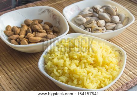 Traditional Indian Pongal, Makar Sankranti rice nuts almonds.