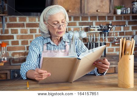 Senior Woman With Cookbook
