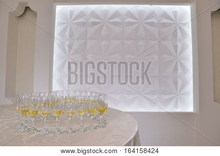 Restaurant champagne glasses arrangements for wedding reception