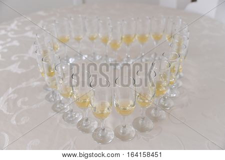 Restaurant champagne glasses arrangements for wedding reception