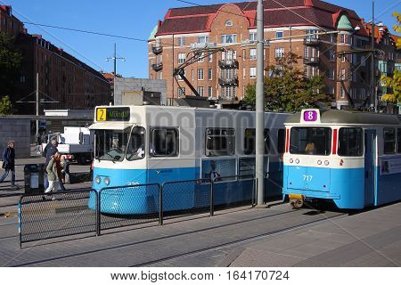 Gothenburg Sweden - Oct. 4. 2016: Transit streetcars at a main street stop in Gothenburg Sweden Scandinavia