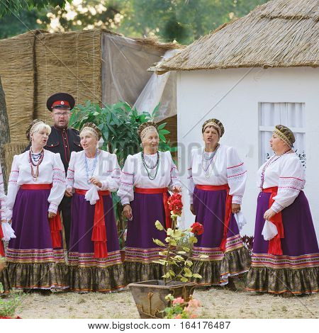 SLAVYANSK-ON-KUBAN RUSSIA - JULY 31.2015: Cossacks sing at a village fete