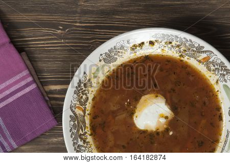 Russian cabbage soup (Shchi) in ceramic bowl