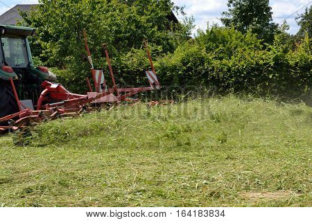 Tedder at the feed harvest in the field