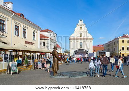 MINSK BELARUS - OCTOBER 1 2016: Unidentified people are walking on Freedom Square on weekend Minsk Belarus