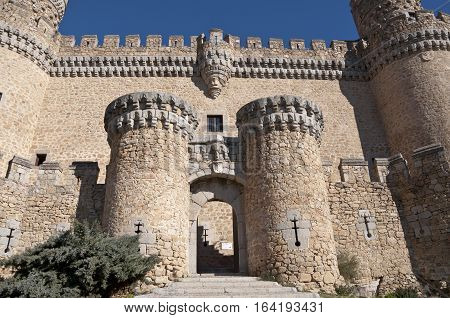 Entrance door of the New Castle of Manzanares el Real Madrid Province Spain. Also known as Castle of los Mendoza is a palace-fortress erected in the 15th century