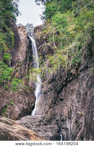 Khlong Phlu waterfall in deep forest at Mu Koh Chang National Park, Chang island, Thailand.