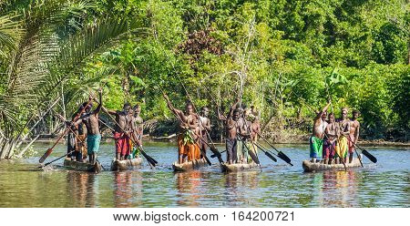 Indonesia, Irian Jaya, Asmat Province, Jow Village - June 23: Canoe War Ceremony Of Asmat People. He