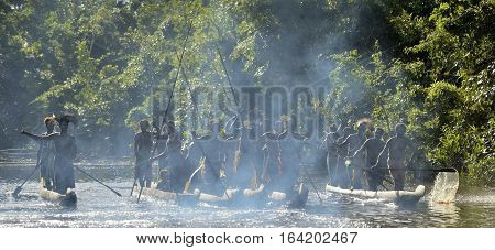 Indonesia, Irian Jaya, Asmat Province, Jow Village - June 23: Canoe War Ceremony Of Asmat People. He