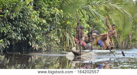 Indonesia, Irian Jaya, Asmat Province, Jow Village - June 23: Canoe War Ceremony Of Asmat People. He