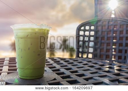 iced milk green tea on natural view for background