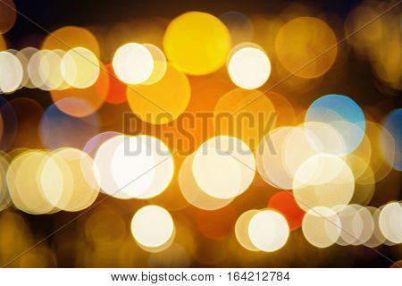 Colorfull bokeh glitter defocused lights abstract background.
