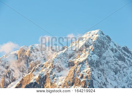 The peak of the Grimming mountain during sunset. Mountain in the Austrian Alps.