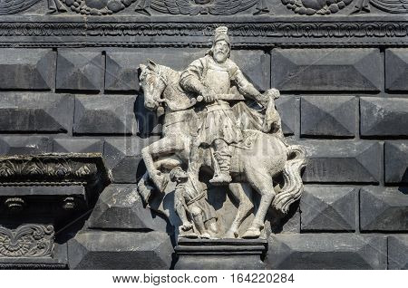 Ancient sculpture of St. Martin on the wall of the Black Kamenica in Lviv Ukraine