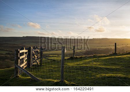 Beautifiul Late Winter Evening Sunlight Raking Across Stunning English Countryside Landscape