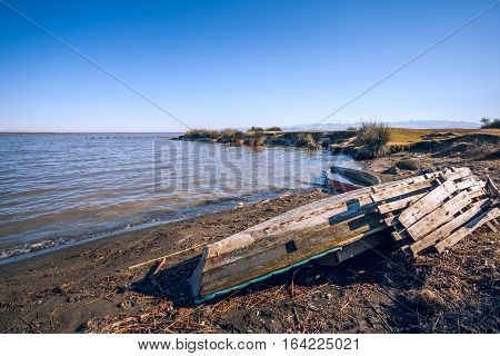 old wooden fishing boat in the lake Paliastomi Poti Georgia.