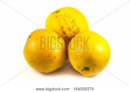 Ripe quinces isolated on white, raw food.