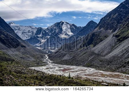 Altai mountains. Highland Akem river on background of glaciers of mountain Beluha