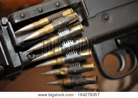bullets and machinegun.  fully automatic mounted or portable firearm,