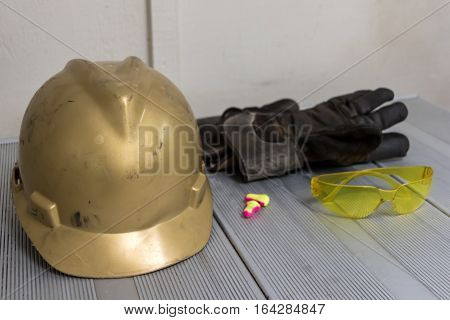 Personal Protective Equipment isolated on a table.