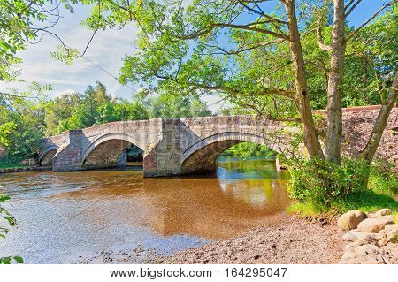 Pooley Bridge over the River Eamont at the northern end of Ullswater. Erected in 1764 the bridge collapsed in December 2015 when Cumbria was hit by heavy flooding resulting from Storm Desmond. HDR image.