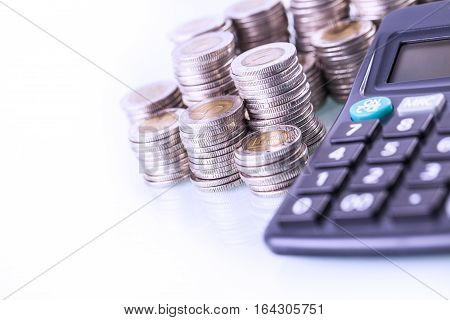 Couns And Calculator On White Background