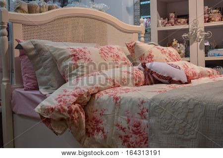 Large family house bed with pillows in the form of the heart wardrobe with beautiful things