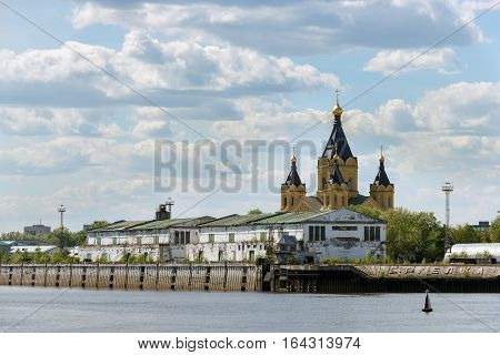 Nizhny Novgorod. The old buildings of the cargo river port on the Strelka and Alexander Nevsky Cathedral