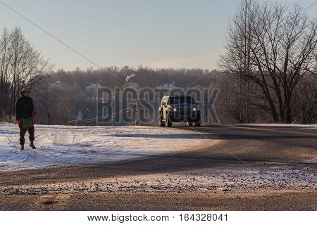 The river Tosno, Leningrad oblast, Russia - January 01, 2017, H3 Hammer on the shore of the river, the Hummer H3 is a compact SUV produced by GM