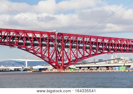Minato Bridge (red bridged) in Osaka port Japan