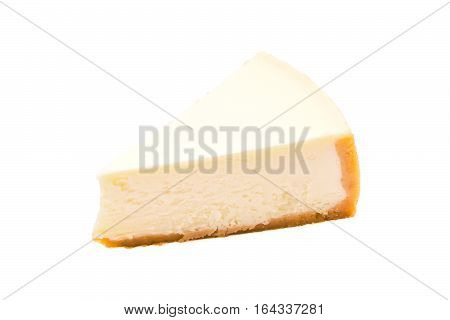 Slice of new york cheesecake isolated on white background. Sweet Dessert close up.