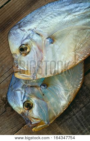two Vomero closeup. Cold smoked. On a wooden background