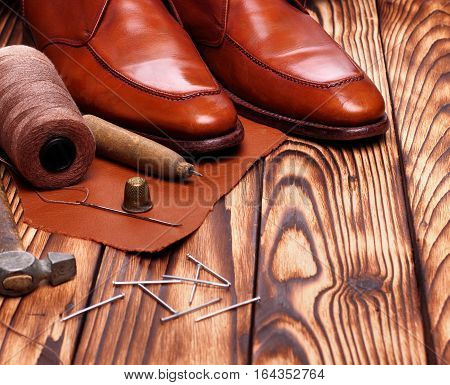 Fashion Derby Shoes Handmade And Shoemaker Tools Awl, Nails, Skien Of Thread .wooden Background.copy