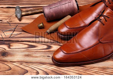 Fashion Derby Shoes Handmade And Shoemaker Tools Awl, Nails, Skien Of Thread .wooden Background.copy