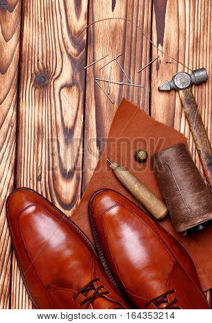 Fashion Derby Shoes Handmade And Shoemaker Tools Awl, Nails, Skien Of Thread .wooden Background.copy