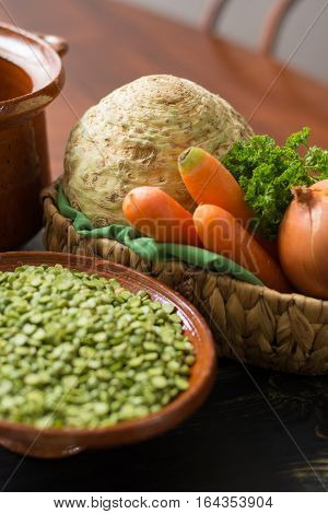 Ingredients for dried split pea vegetarian soup - carrot celery root onion parsley
