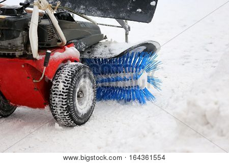 special machine for snow removal cleans the road